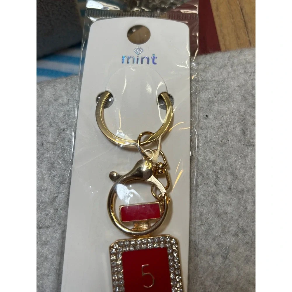 #8. Red Bag Charm Keychain Perfume Bottle-inspired